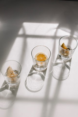 sunshine in glass of water with lemon