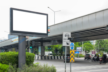 Blank billbaord mock up information board on the street. Advertising concept