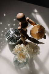 close up of a wooden man on the table