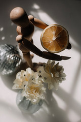 still life with a lemon and daffodils