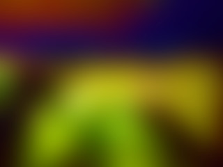 Abstract blurred yellow, blue, green and red background