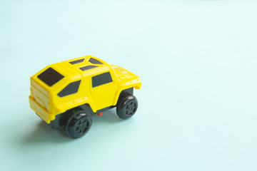 Minimalism, children's machine on a background. Copy space