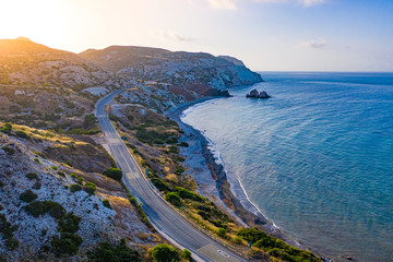 Cyprus from a height. The Mediterranean coast from a drone. Mountain road along the sea coast....