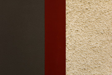 Brown, red and yellow grainy wall texture