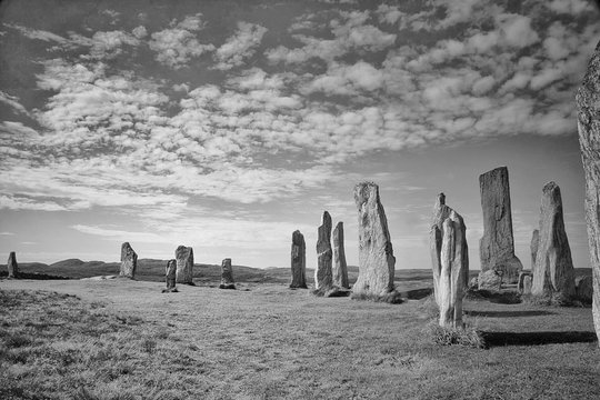 Callanish Stones On Field Against Sky
