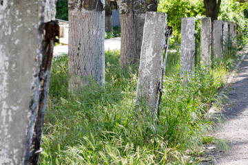 Naklejka premium Concrete pillars along the road