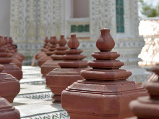 Top of column on wall in Thai style at Wat Arun temple (After big renovate)