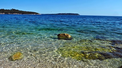 Stones in the cleanest and most transparent Mediterranean sea © Star Labs