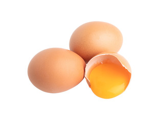 two eggs and broken raw egg isolated on the white background