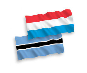 Flags of Botswana and Luxembourg on a white background