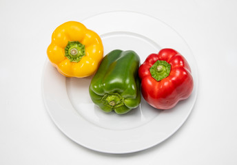 three-color peppers on a plate