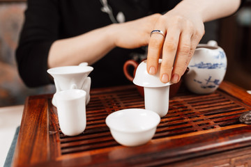 Chinese tea ceremony. Girl making chinese tea