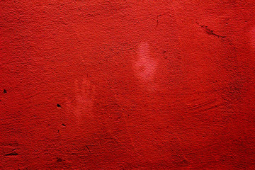 Red colored wall texture background with textures of different shades of red