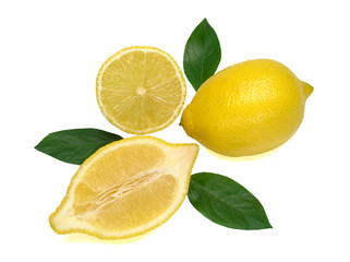One whole yellow lemon and two halves of lemon with green leaves isolated on a white background