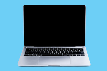 Laptop and black screen on blue background