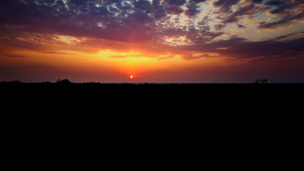 Sunset / sunrise with clouds, Panoramic view of a cloudy sky at sunset