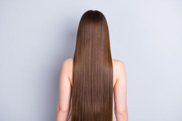 Rear back behind view photo of perfect model lady demonstrating ideal neat long hairstyle after salon procedure bath shower wear nothing isolated grey color background