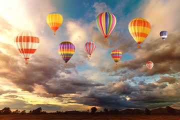 hot air balloon over cloudy sky.