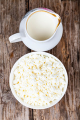 Dairy products on a wooden table.