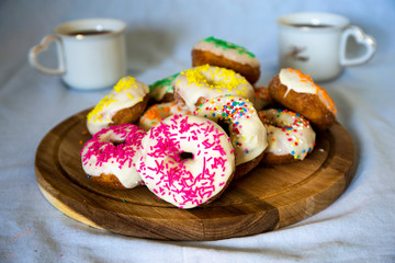 Sweet Donuts And Two Cups Of Coffee