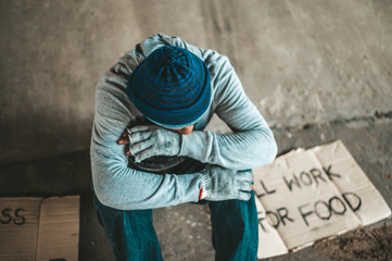 Begging under the bridge with the message will work for food.