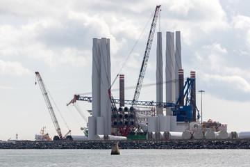 Renewable energy offshore windfarm industry wind turbine construction and distribution. Outer...