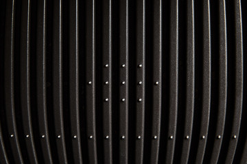 black electric grill grate textured background
