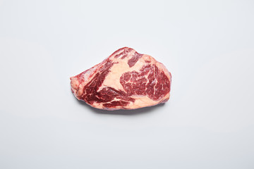 fresh raw steak on on white background