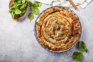 Fresh baked greek spanakopita with spinach, feta cheese and a flaky crust
