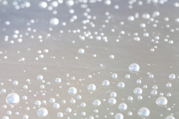 Background design made of water drops on a gray background	