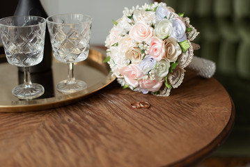 Wedding rings and bouquet. Wedding rings. Wedding bouquet. 