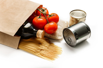 Paper bag with products isolated on a white background.