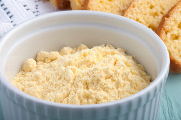 Polenta or cornmeal isolated on white