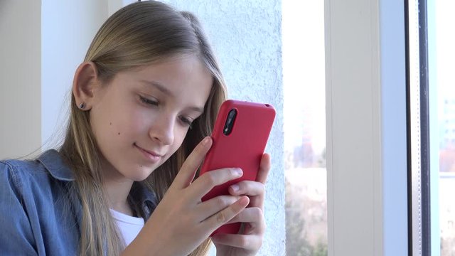 Kid Using Smartphone, Child Browsing Internet, Talking on Smart Phone, Teenager Girl Communicating with Parents, Technology