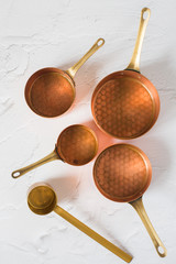 Copper utensils. Vintage copper cookware - cocottes, creamer and accessories for coffee.