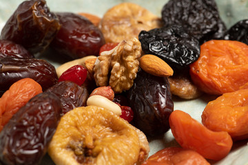 Mix of dried fruits and nuts. Dates, dried apricots nuts french plum is usualy used by muslims during iftar time