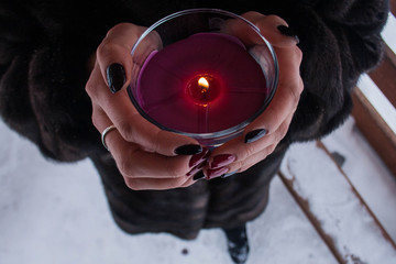 candle in the hands