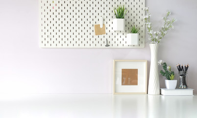 Mockup workspace desk and copy space books,plant and coffee on wood desk.