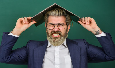 Online madness. Provide accurate current information. Teacher hold laptop surfing internet. Bearded...