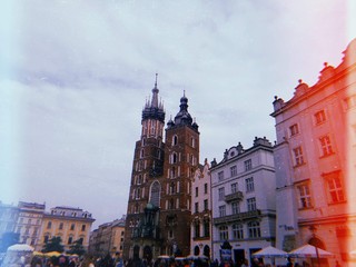 Old town square in Cracow on cloudly weather. Castle in Cracow