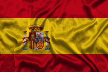 Fototapeta premium Spain national flag background with fabric texture. Flag of Spain waving in the wind. 3D illustration