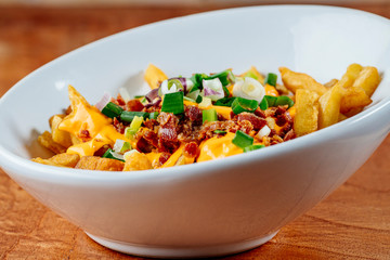 fries with vegetables and bacon