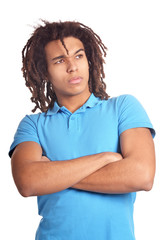 Thoughtful African American young man with crossed arms