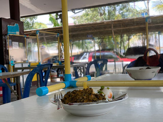 Social distancing rules in practice, alternate seating in local public food courts are separated in...