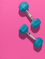 Blue Hand Weights on Pink