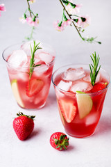 Glasses of Fresh and Cold Strawbery and Green Apple Lemonade Tasty and Healthy Summer Drink Cold Berry and Fruit Lemonade Vertical