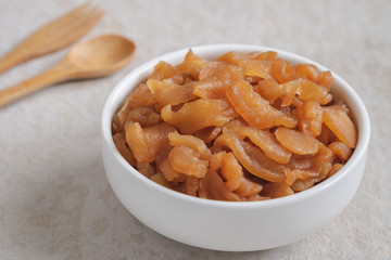 Pickle turnip in white bowl.