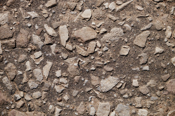 The texture of the broken road. Old building blocks. Background for screensaver monitor