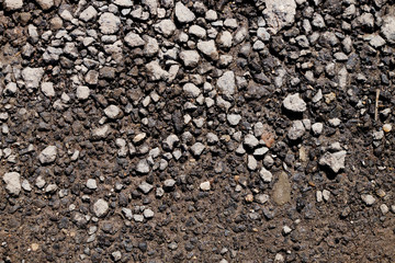 The texture of the broken road. Old building blocks. Background for screensaver monitor