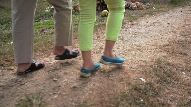 Women's Feet Walking On The Rough Trail In The Philippines - closeup shot